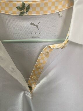 Puma women’s White Polo with Yellow Check Trim